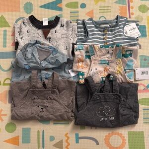 6 Rompers in sz 6-9M